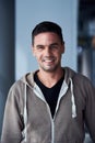 Portrait of handsome man in the hall of airport terminal Royalty Free Stock Photo