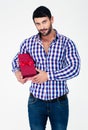 Portrait of a handsome man holding gift box Royalty Free Stock Photo