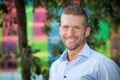 Portrait of a handsome man smiling at the camera. Royalty Free Stock Photo