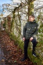 Portrait of handsome man standing outside in autumn weather. Calm Man Outdoors Relaxing And Breathing In Deeply In Royalty Free Stock Photo