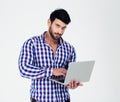 Portrait of a handsome man using laptop computer Royalty Free Stock Photo