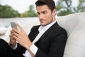 Portrait of a handsome man using smartphone