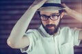 Portrait of handsome man wearing eyeglasses and hat Royalty Free Stock Photo