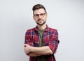 Portrait of a handsome man wearing glasses on grey background Royalty Free Stock Photo