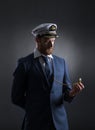 Portrait of a handsome sailor on a dark background