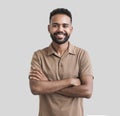 Portrait of handsome smiling young man with folded arms. Laughing joyful cheerful men with crossed hands isolated studio shot Royalty Free Stock Photo