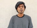 south Indian tamil young man with clean-shaven face. White background