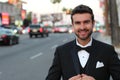 Portrait of handsome stylish man in elegant black suit Royalty Free Stock Photo