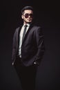 Portrait of handsome stylish man in elegant black suit Royalty Free Stock Photo