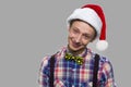 Portrait of handsome teen boy in Chistmas hat. Royalty Free Stock Photo