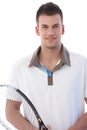 Portrait of handsome tennis player smiling Royalty Free Stock Photo