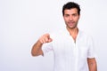 Portrait of handsome Turkish man pointing at camera Royalty Free Stock Photo