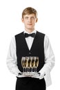 Portrait of handsome waiter holding silver tray with glasses of Royalty Free Stock Photo