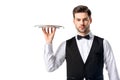 portrait of handsome waiter in suit vest with empty serving tray Royalty Free Stock Photo