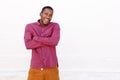 Handsome young african man laughing with arms crossed Royalty Free Stock Photo