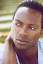 Portrait of a handsome young black man looking away Royalty Free Stock Photo
