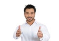 Portrait of handsome young business man, student, employee, customer giving thumbs up sign Royalty Free Stock Photo