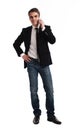 Young happy man holding mobile phone Royalty Free Stock Photo