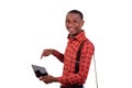 Young businessman pointing finger at digital tablet screen smiling Royalty Free Stock Photo