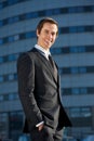 Portrait of a handsome young businessman smiling outdoors Royalty Free Stock Photo