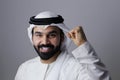 Portrait Of A Very Confident Arab Emirati Man Happy Smiling And Wearing UAE Traditional Dress