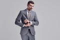 Handsome young arabic businessman with mustache in fashion gray suit Royalty Free Stock Photo