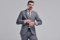 Handsome young arabic businessman with mustache in fashion gray suit Royalty Free Stock Photo