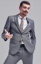 Handsome young arabic businessman with mustache in fashion gray suit Royalty Free Stock Photo