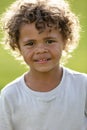 Portrait of a handsome young diverse black boy with curly hair Royalty Free Stock Photo