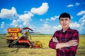 Young farmer working in his rice field Royalty Free Stock Photo