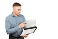 Portrait of handsome young guy holding folder and pen. Isolated on white background Royalty Free Stock Photo