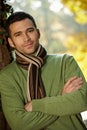 Portrait of handsome young man in autumn park Royalty Free Stock Photo