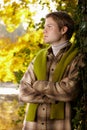 Portrait of handsome young man in autumn park Royalty Free Stock Photo