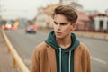 Portrait of a handsome young man with a haircut in a vintage Royalty Free Stock Photo