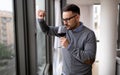 Portrait of handsome young man holding glass of red wine Royalty Free Stock Photo