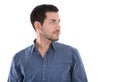 Portrait of handsome young man looking sideways in blue shirt is Royalty Free Stock Photo