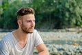 Portrait of handsome young man outdoors in nature Royalty Free Stock Photo