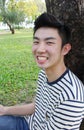 Portrait of a handsome young man posing outdoor. Royalty Free Stock Photo