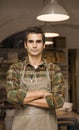 Handsome young man posing in pottery workshop Royalty Free Stock Photo