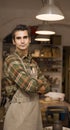 Handsome young man posing in pottery workshop Royalty Free Stock Photo