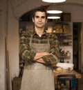 Handsome young man posing in pottery workshop Royalty Free Stock Photo