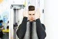 Portrait of a handsome young man training in a gym Royalty Free Stock Photo