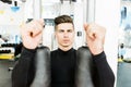 Portrait of a handsome young man training in a gym Royalty Free Stock Photo