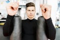 Portrait of a handsome young man training in a gym Royalty Free Stock Photo