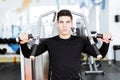 Portrait of a handsome young man training in a gym Royalty Free Stock Photo