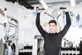 Portrait of a handsome young man training in a gym Royalty Free Stock Photo