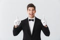 Portrait of a handsome young man waiter Royalty Free Stock Photo