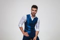 Portrait of handsome young man wearing a blue gilet Royalty Free Stock Photo