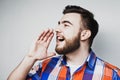 Portrait of a handsome young man yelling Royalty Free Stock Photo