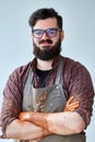 Portrait of handsome young potter with dirty hands, close-up Royalty Free Stock Photo